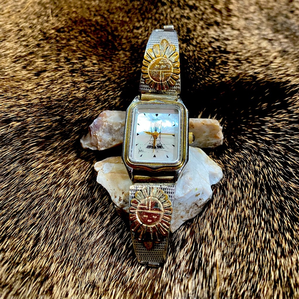 Hot, hot, hot! 24kt and sterling silver Sun Face Southwest watch.